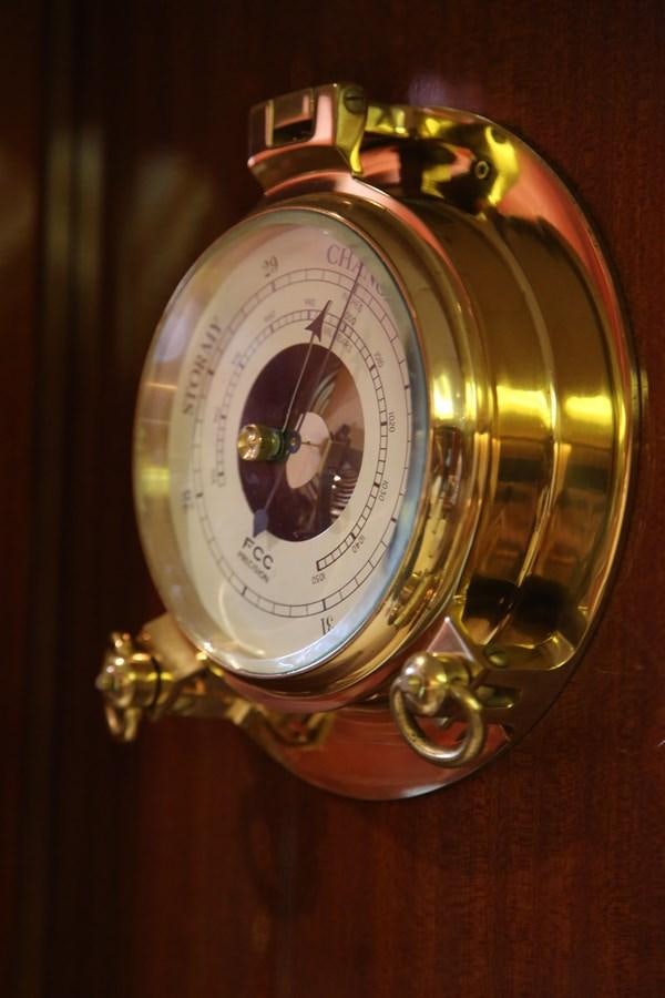 a watch on a table aboard EL VIP ONE Yacht for Sale