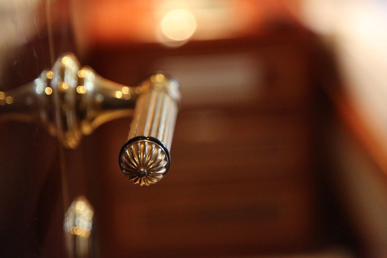 a gold and silver key aboard EL VIP ONE Yacht for Sale