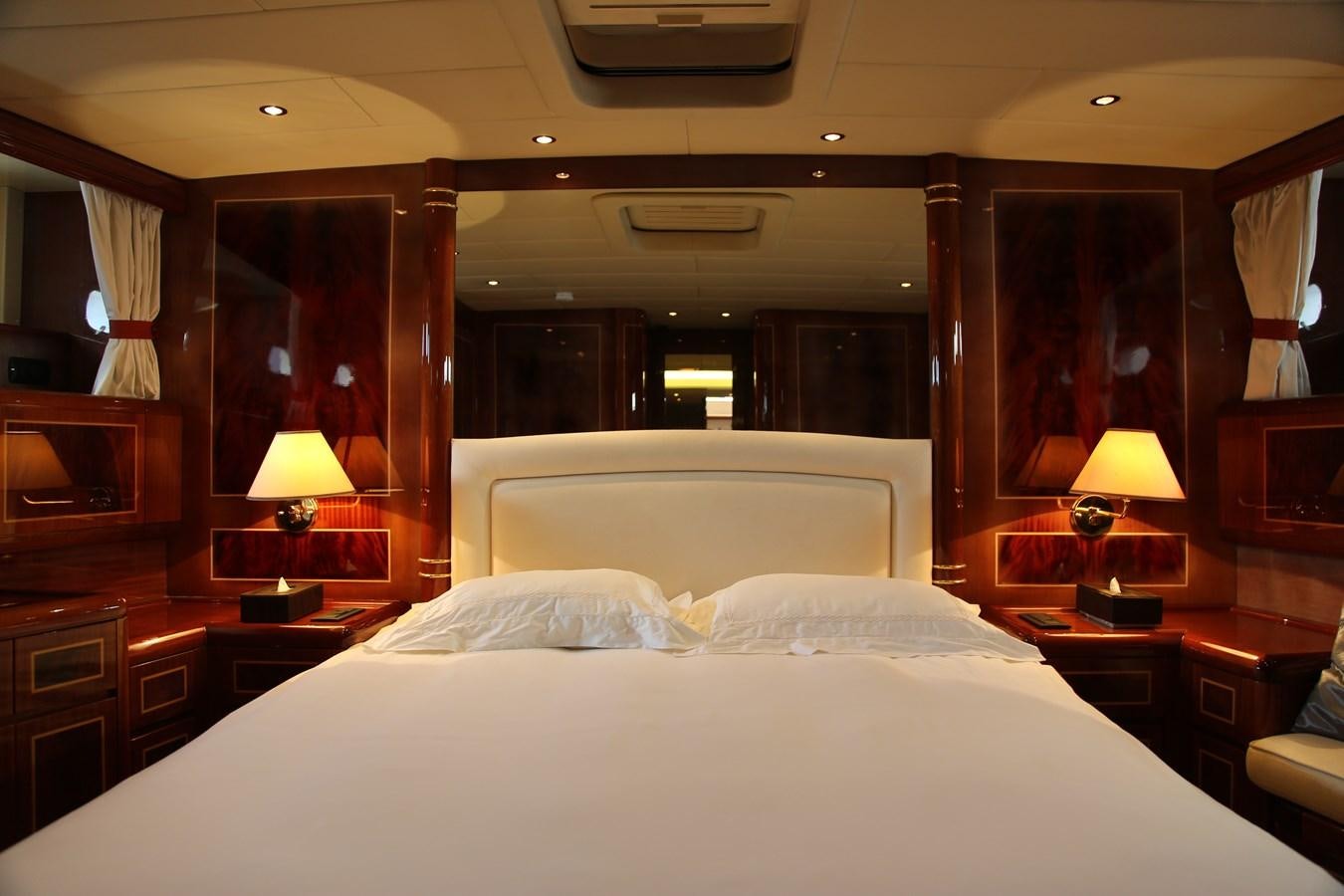 a hotel room with a large bed aboard EL VIP ONE Yacht for Sale