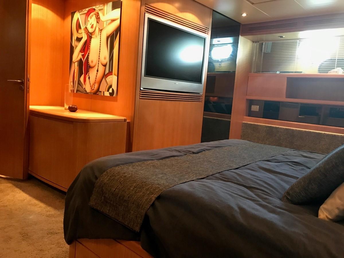 a bed in a room aboard LADY LO OF LONDON Yacht for Sale