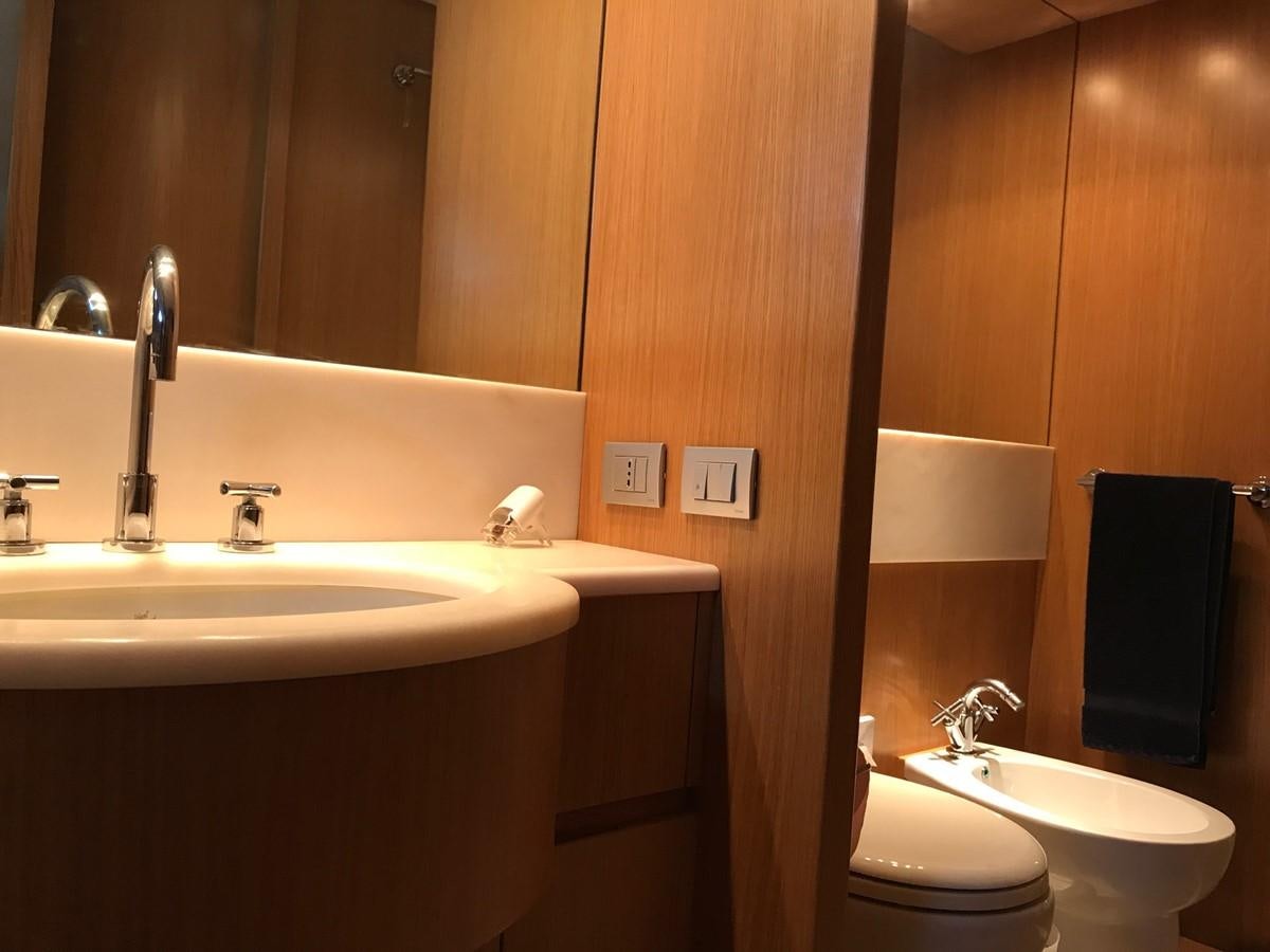 a bathroom with a sink and a toilet aboard LADY LO OF LONDON Yacht for Sale