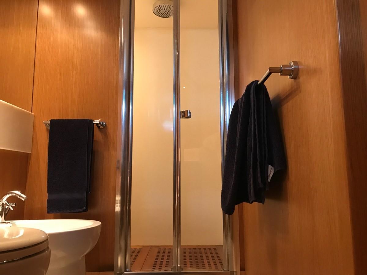 a bathroom with a shower unit and sink aboard LADY LO OF LONDON Yacht for Sale