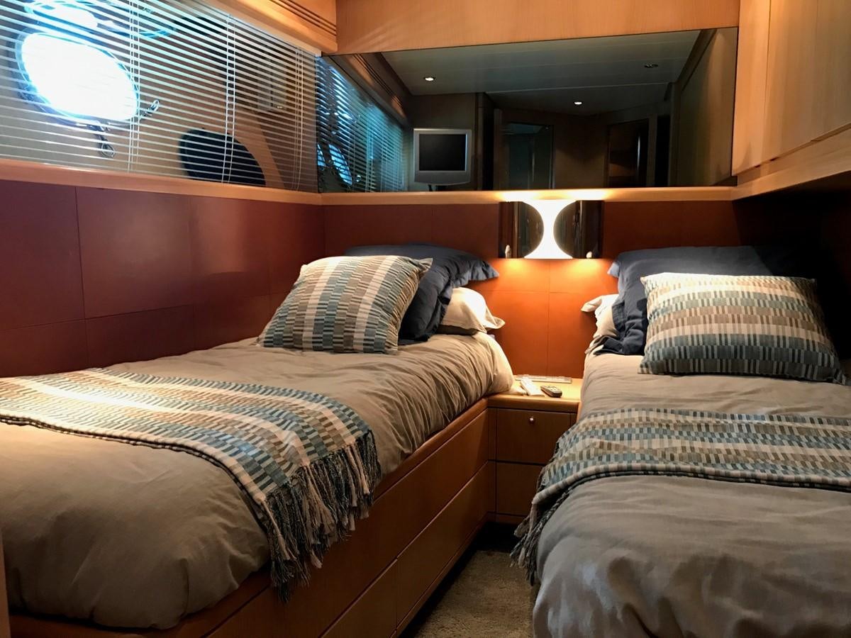 a couple of beds in a room aboard LADY LO OF LONDON Yacht for Sale