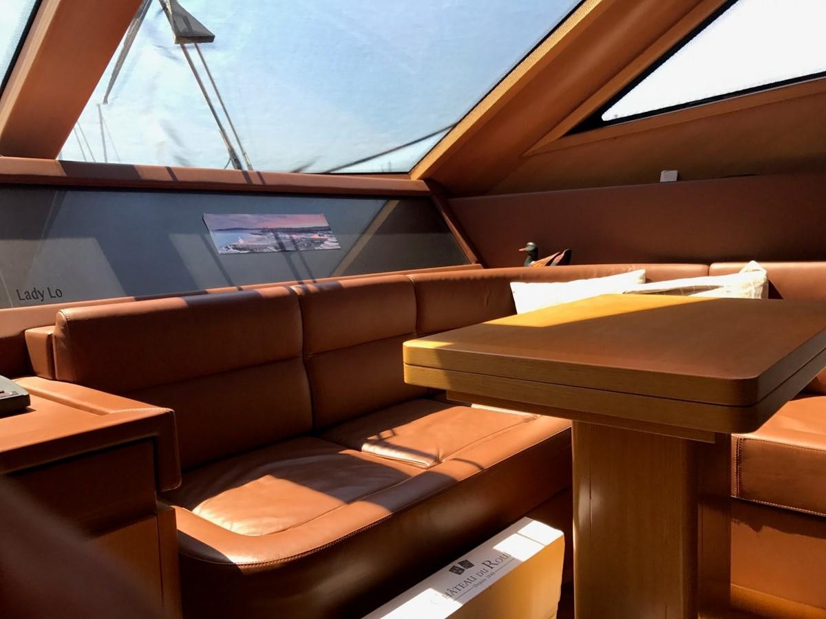 a room with a desk and a window aboard LADY LO OF LONDON Yacht for Sale