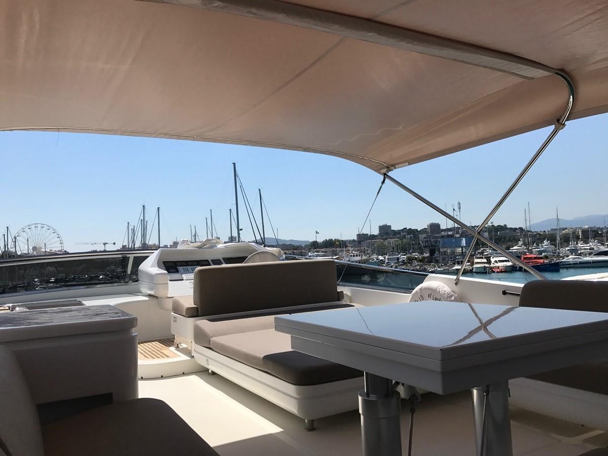 a table with a white tablecloth aboard LADY LO OF LONDON Yacht for Sale