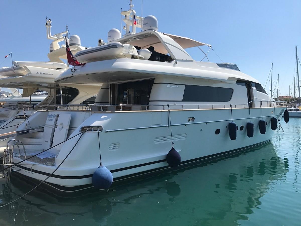 a white yacht on the water aboard LADY LO OF LONDON Yacht for Sale
