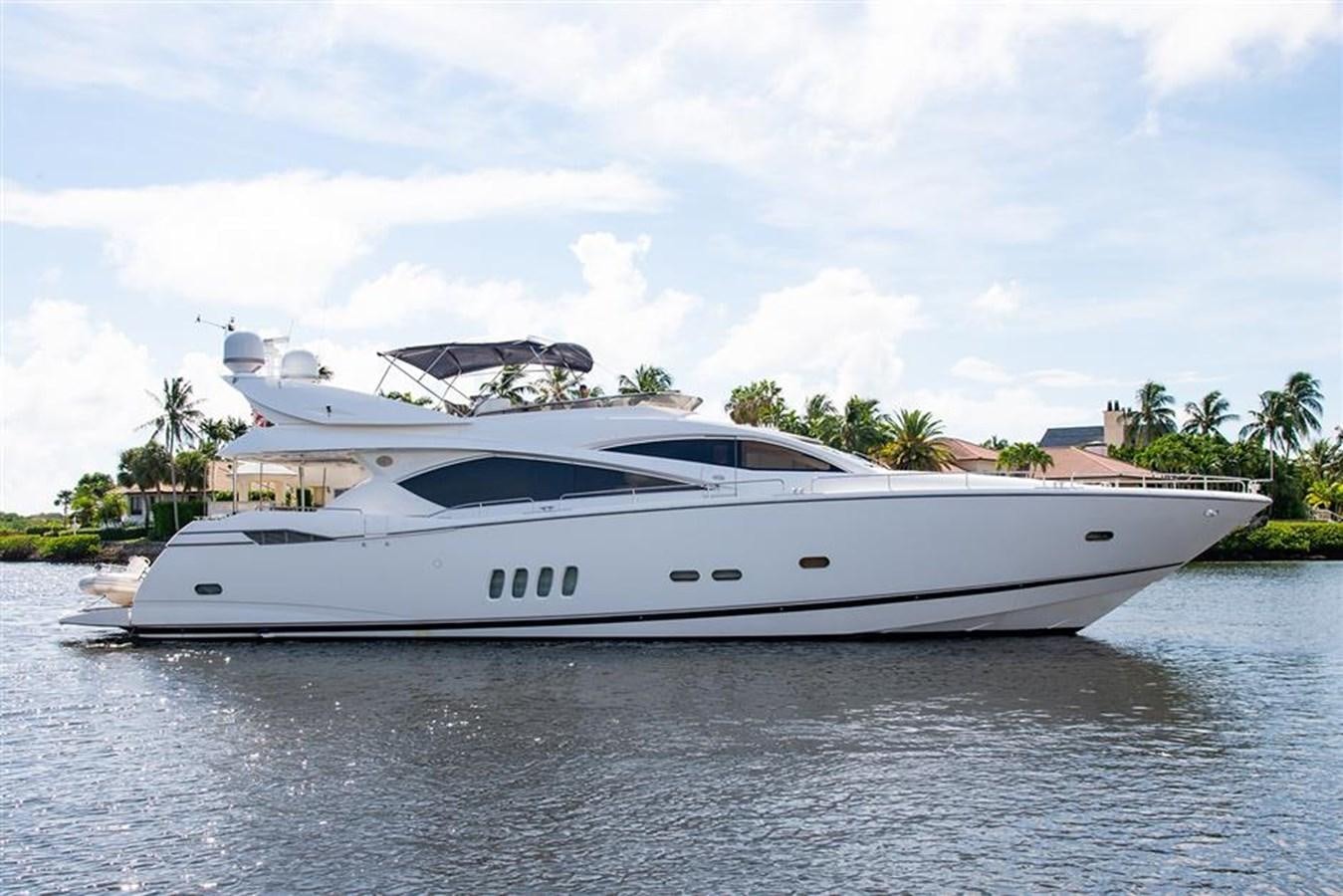 a white yacht on the water aboard MY MEDICINE Yacht for Sale