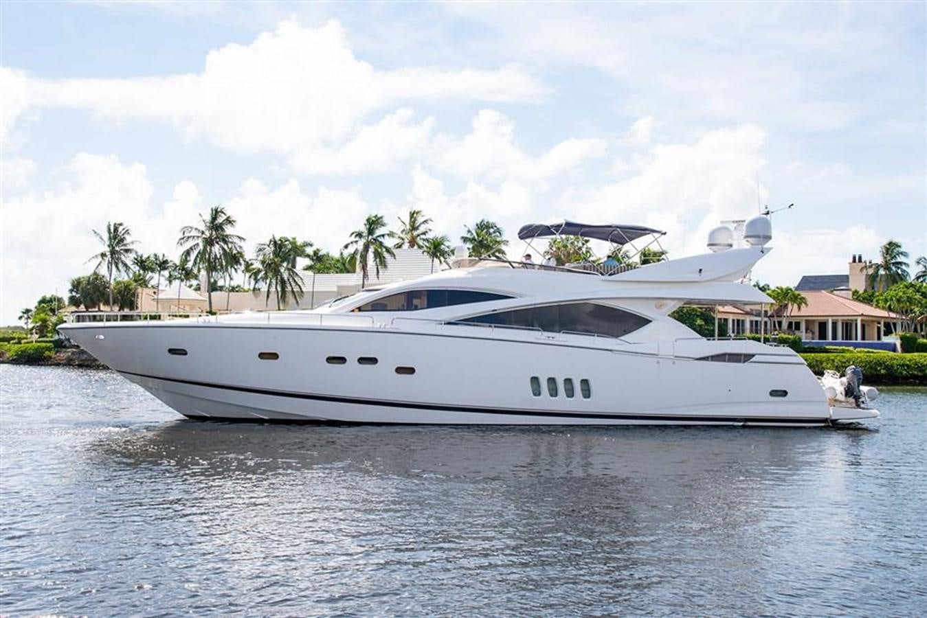 a white yacht on the water aboard MY MEDICINE Yacht for Sale