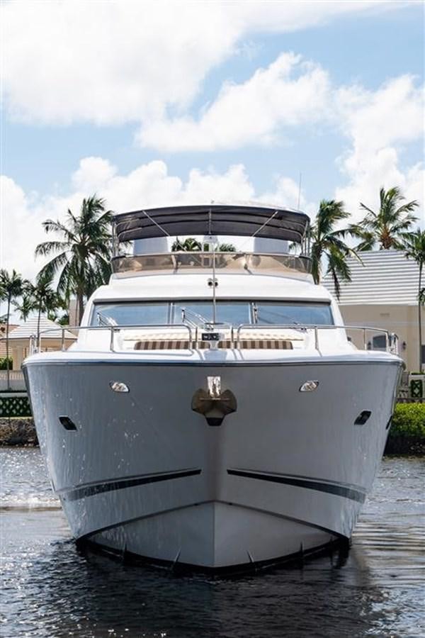 a white boat in the water aboard MY MEDICINE Yacht for Sale