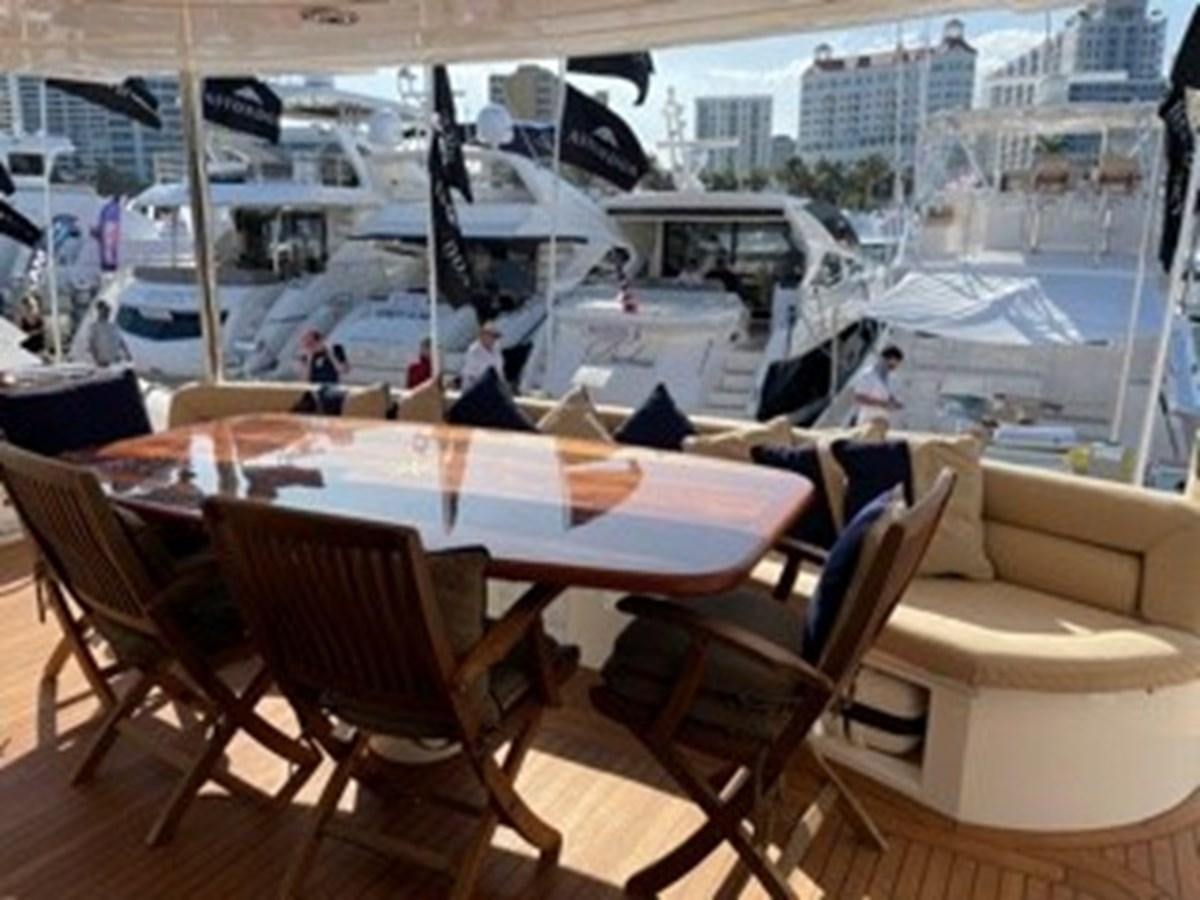 a room with tables and chairs aboard MY MEDICINE Yacht for Sale