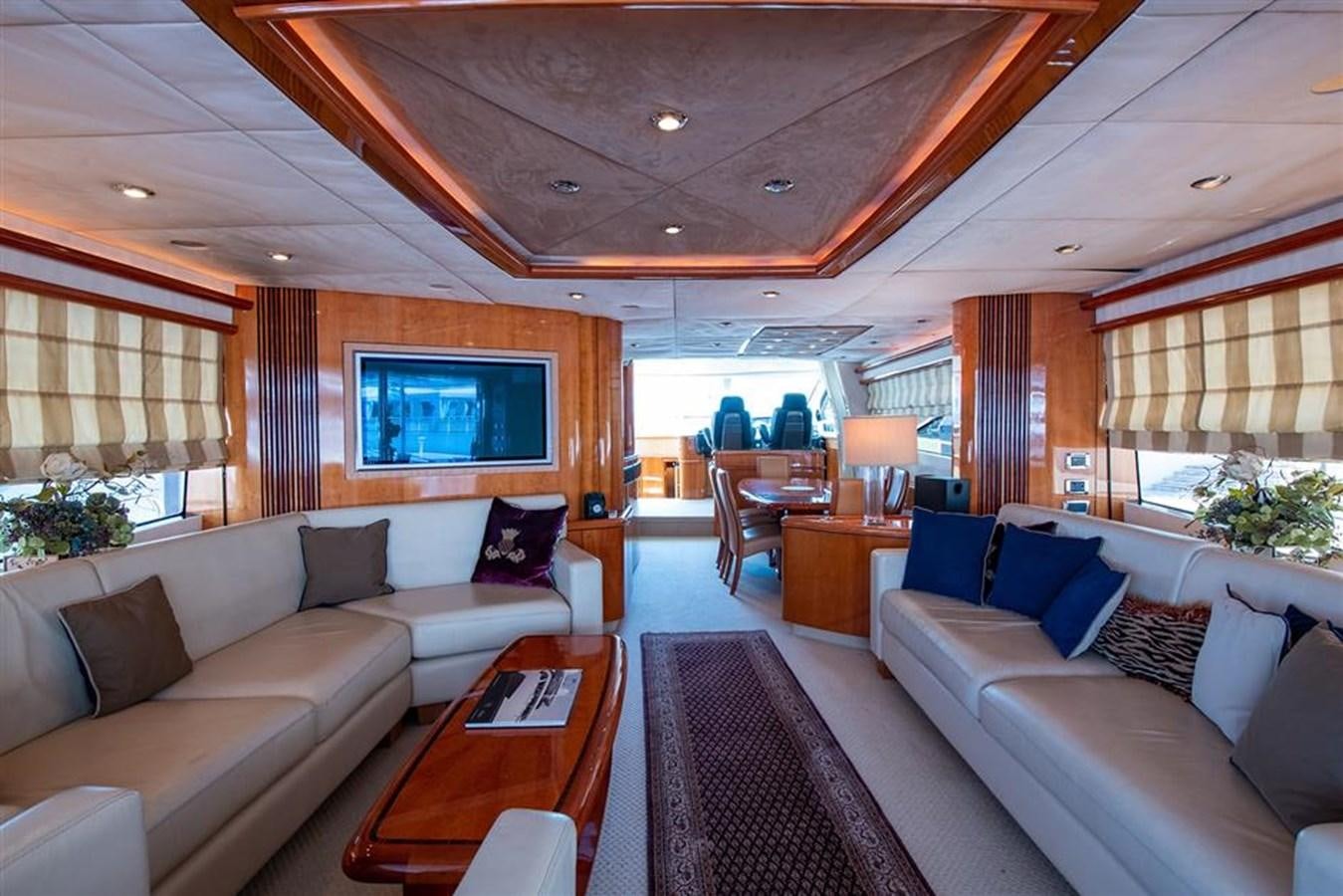 a living room with a couch and a table aboard MY MEDICINE Yacht for Sale
