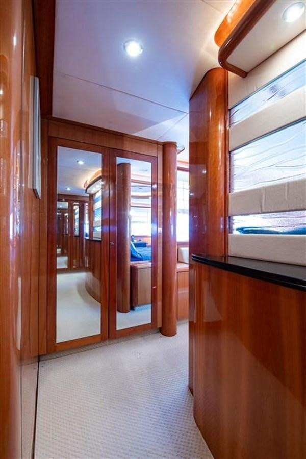 a hallway with wood doors aboard MY MEDICINE Yacht for Sale