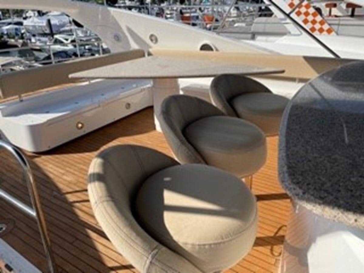 a pair of headphones on a table aboard MY MEDICINE Yacht for Sale