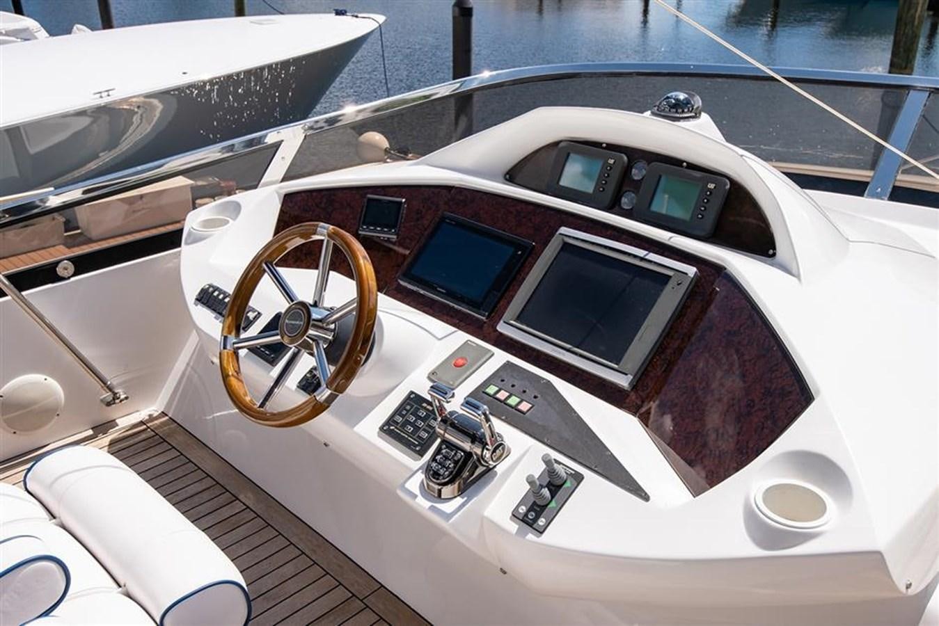 the inside of a white car aboard MY MEDICINE Yacht for Sale