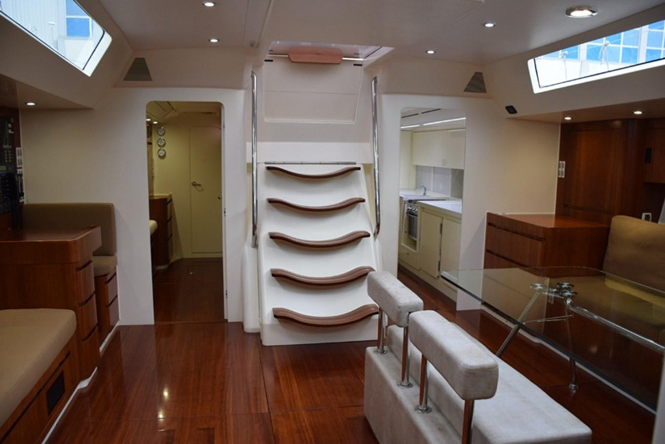 a room with a bunk bed and a couch aboard WHITE DUMBO Yacht for Sale