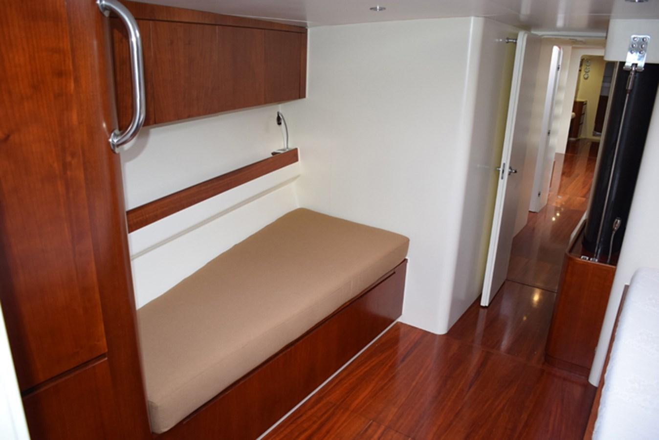 a bed in a room aboard WHITE DUMBO Yacht for Sale