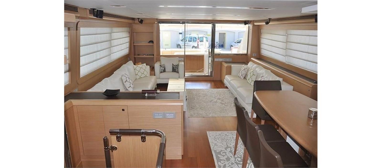 a room with a desk and a bed aboard LA STELLA Yacht for Sale