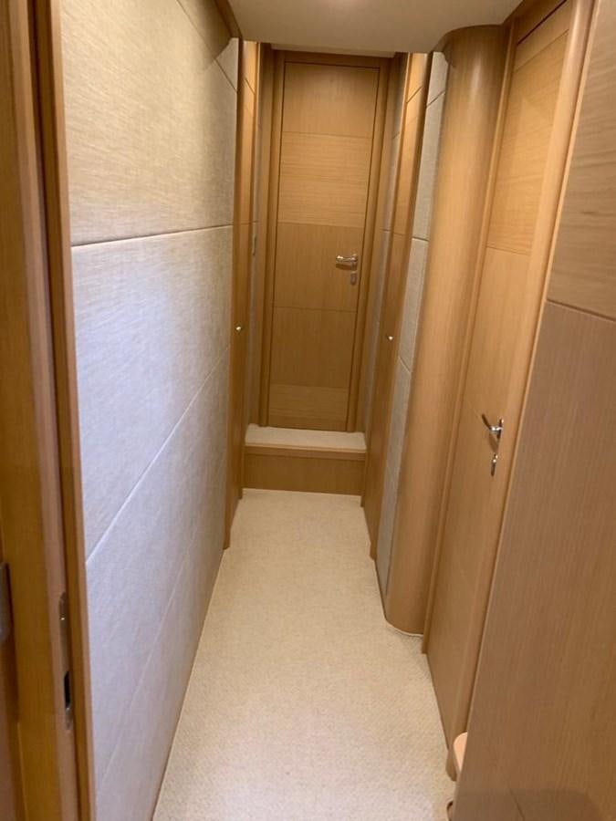 a hallway with a door aboard FERRETTI F800/27 Yacht for Sale