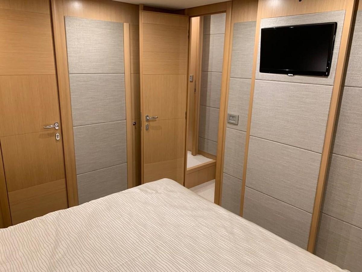 a bed in a room aboard FERRETTI F800/27 Yacht for Sale