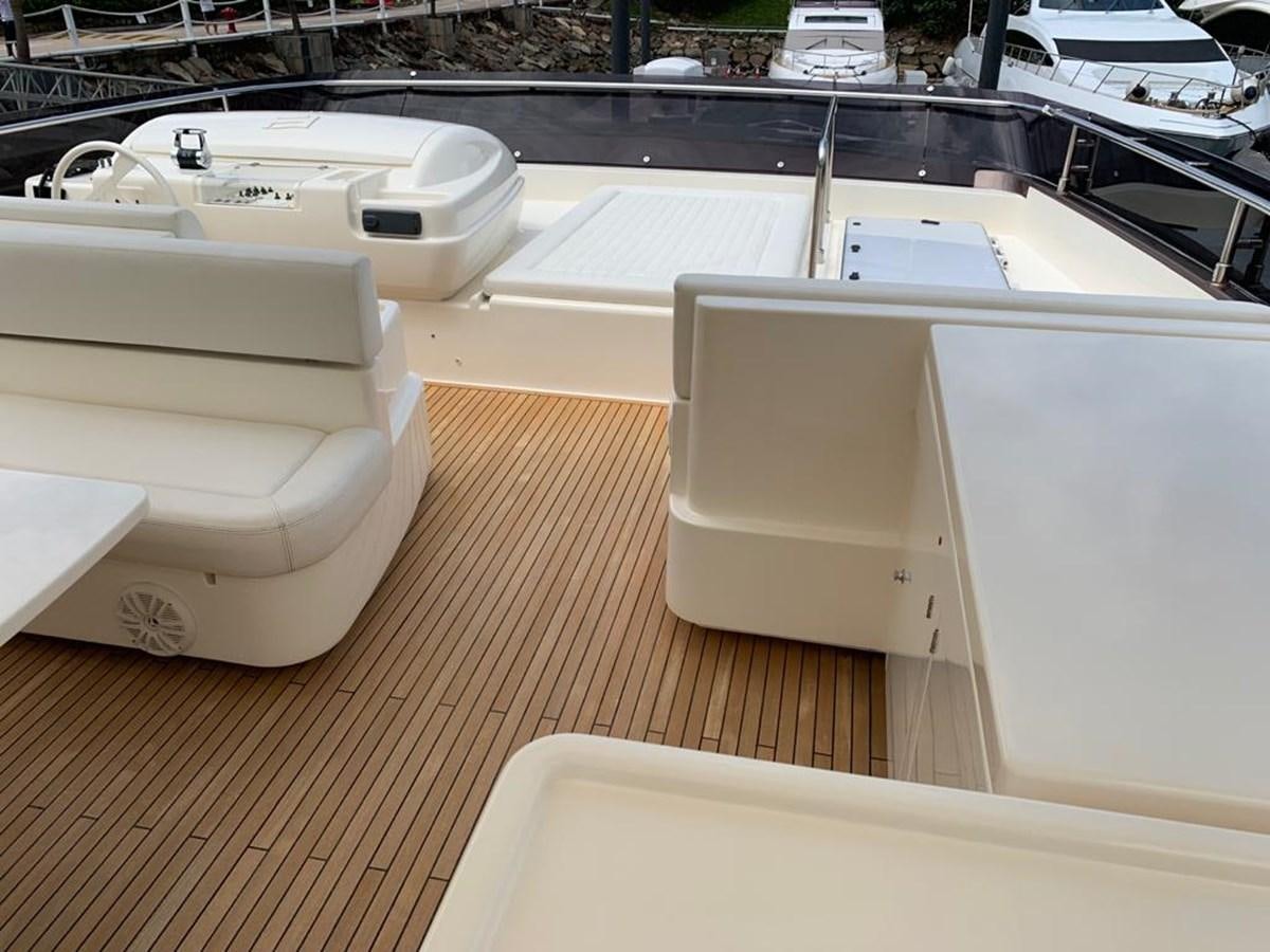 a group of white toilets on a wooden floor aboard FERRETTI F800/27 Yacht for Sale