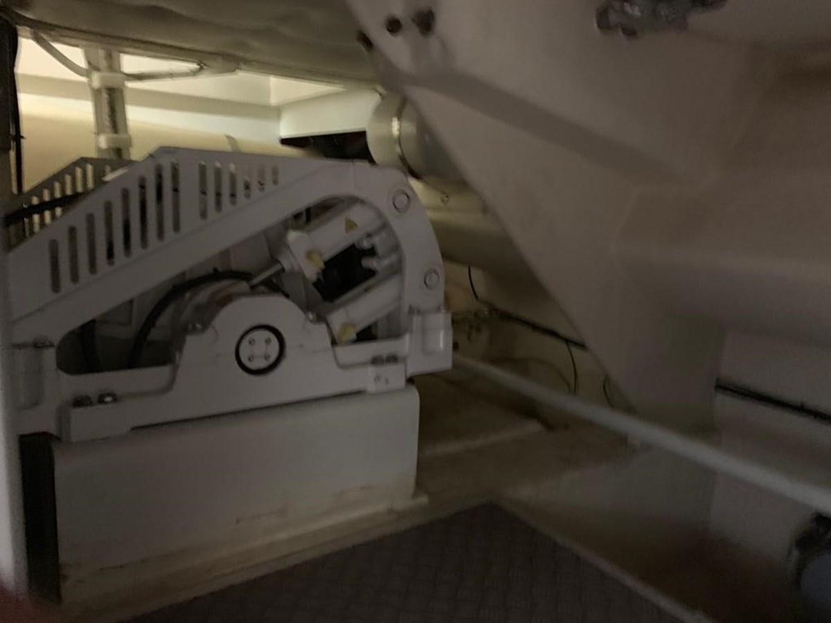a machine in a room aboard FERRETTI F800/27 Yacht for Sale