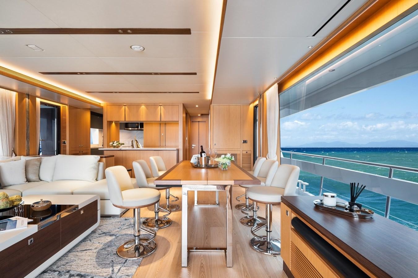 a living room with a large window aboard FD80 SKYLINE (NEW BOAT SPEC ) Yacht for Sale