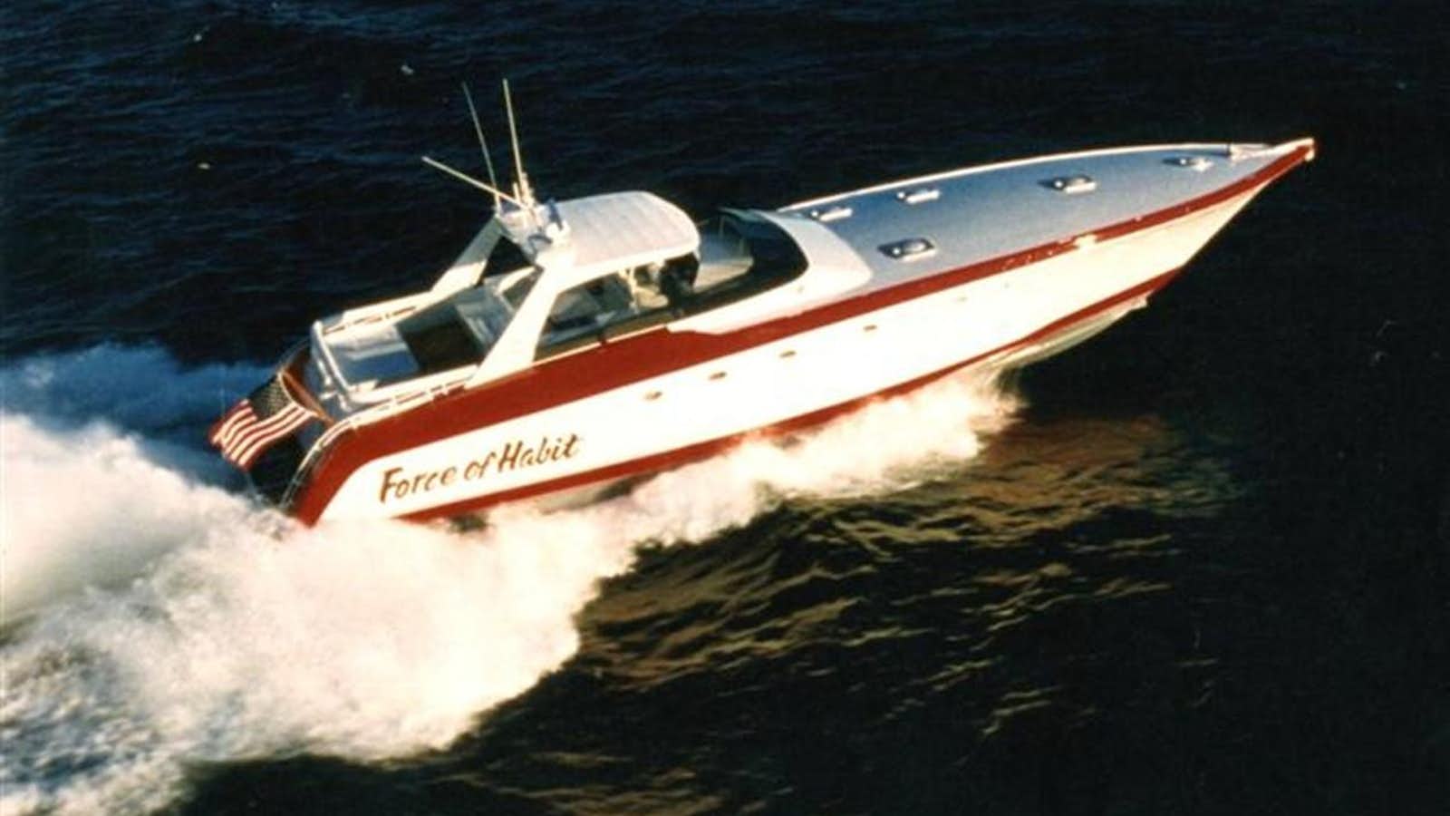 a boat on the water aboard FORCE OF HABIT Yacht for Sale