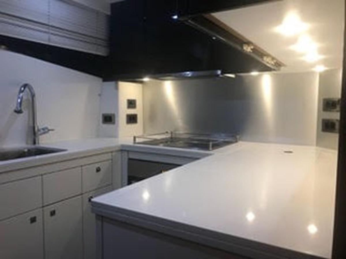 a kitchen with a sink and a faucet aboard 81935-3588701 Yacht for Sale