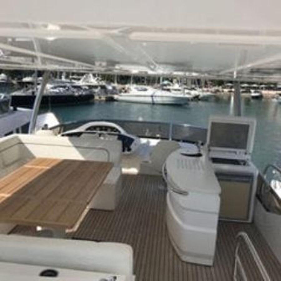 a room with a view of a marina and boats aboard 81935-3588701 Yacht for Sale