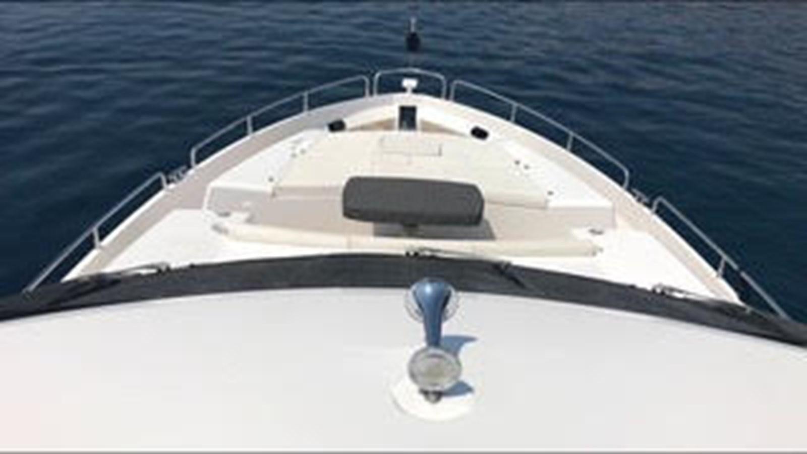 a white boat on the water aboard 81935-3588701 Yacht for Sale