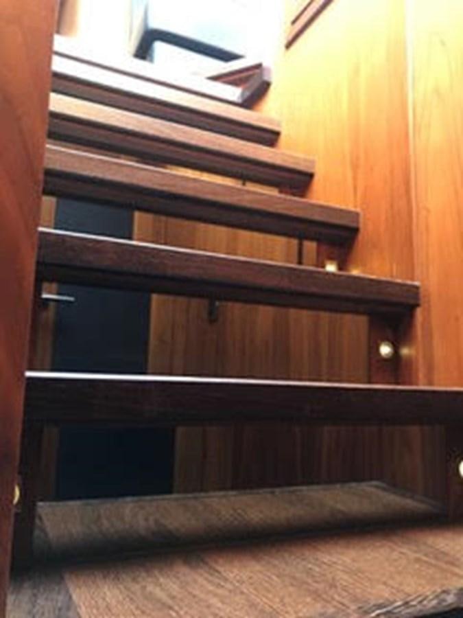 a wooden shelf with a bookcase aboard 81935-3588701 Yacht for Sale