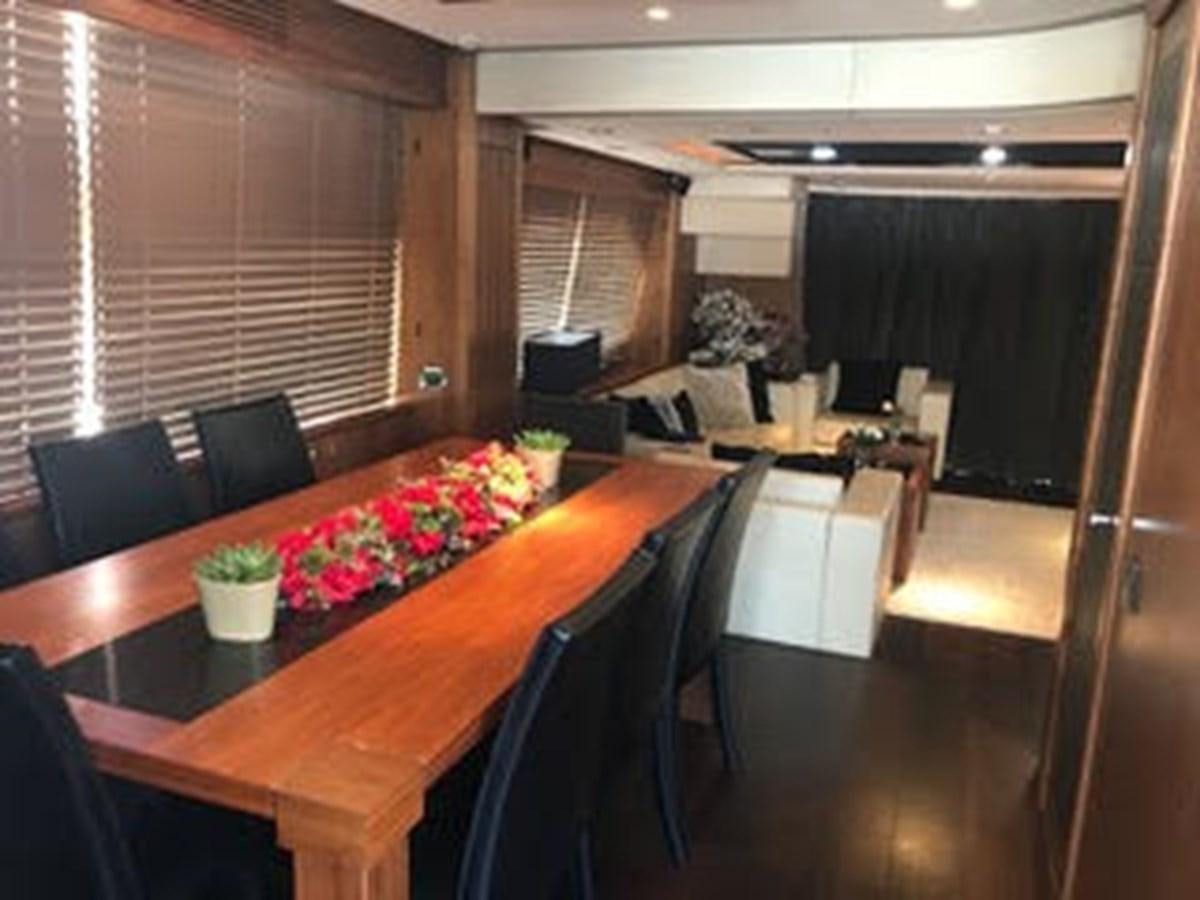 a dining room with a table and chairs aboard 81935-3588701 Yacht for Sale