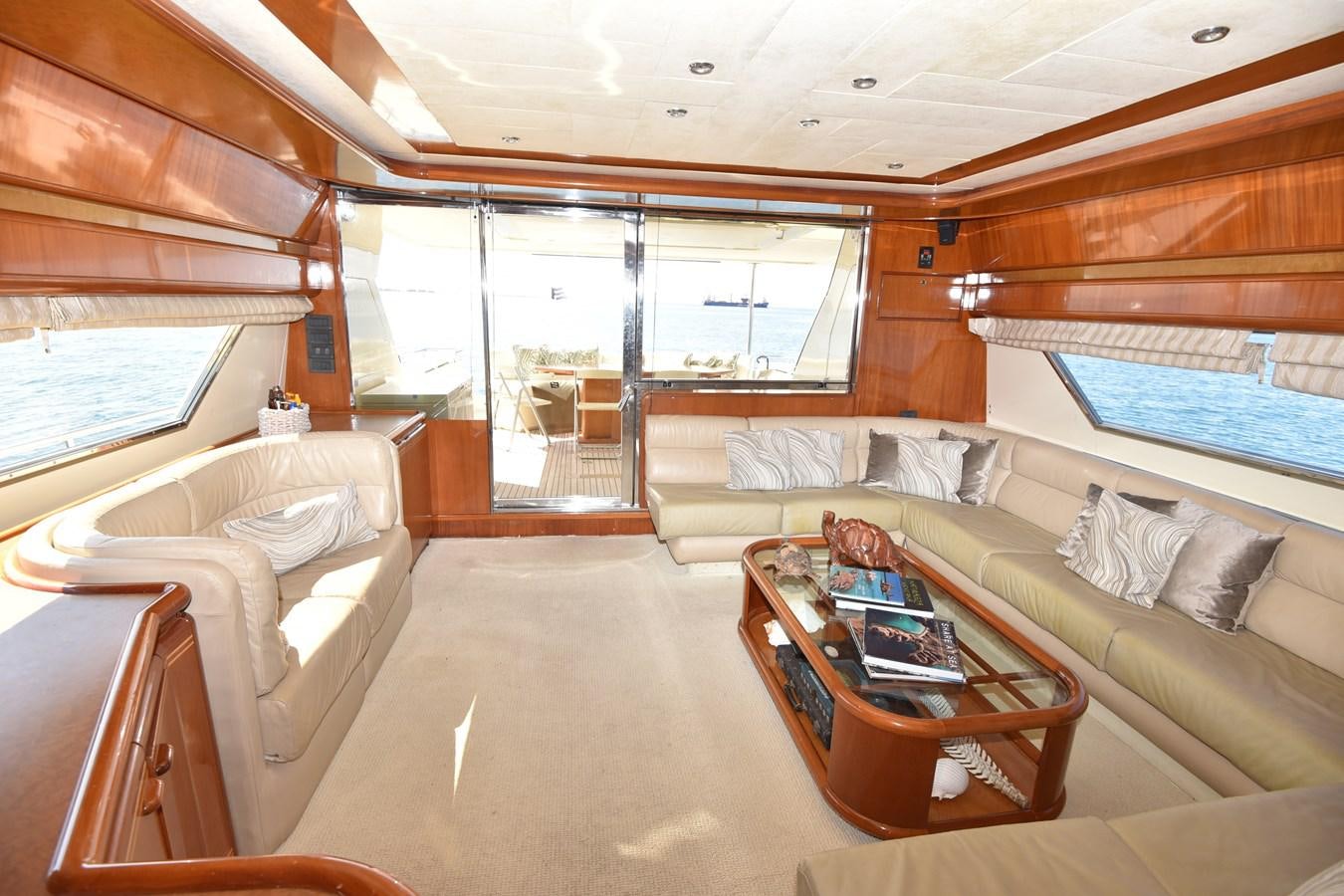 a living room with a large window aboard SANTA MARIA III Yacht for Sale