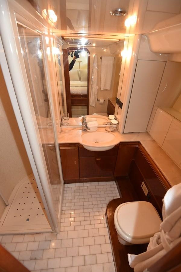 a bathroom with a sink and a toilet aboard SANTA MARIA III Yacht for Sale