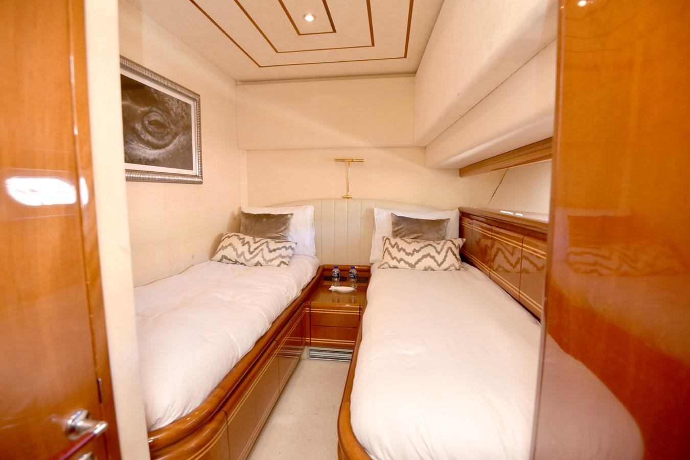 a room with two beds aboard SANTA MARIA III Yacht for Sale
