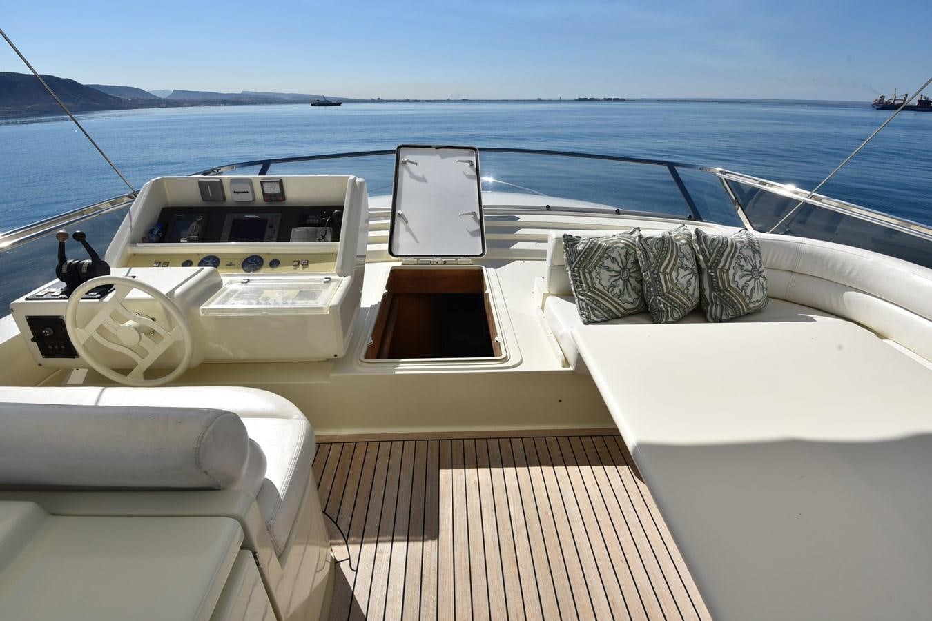 a boat on the water aboard SANTA MARIA III Yacht for Sale