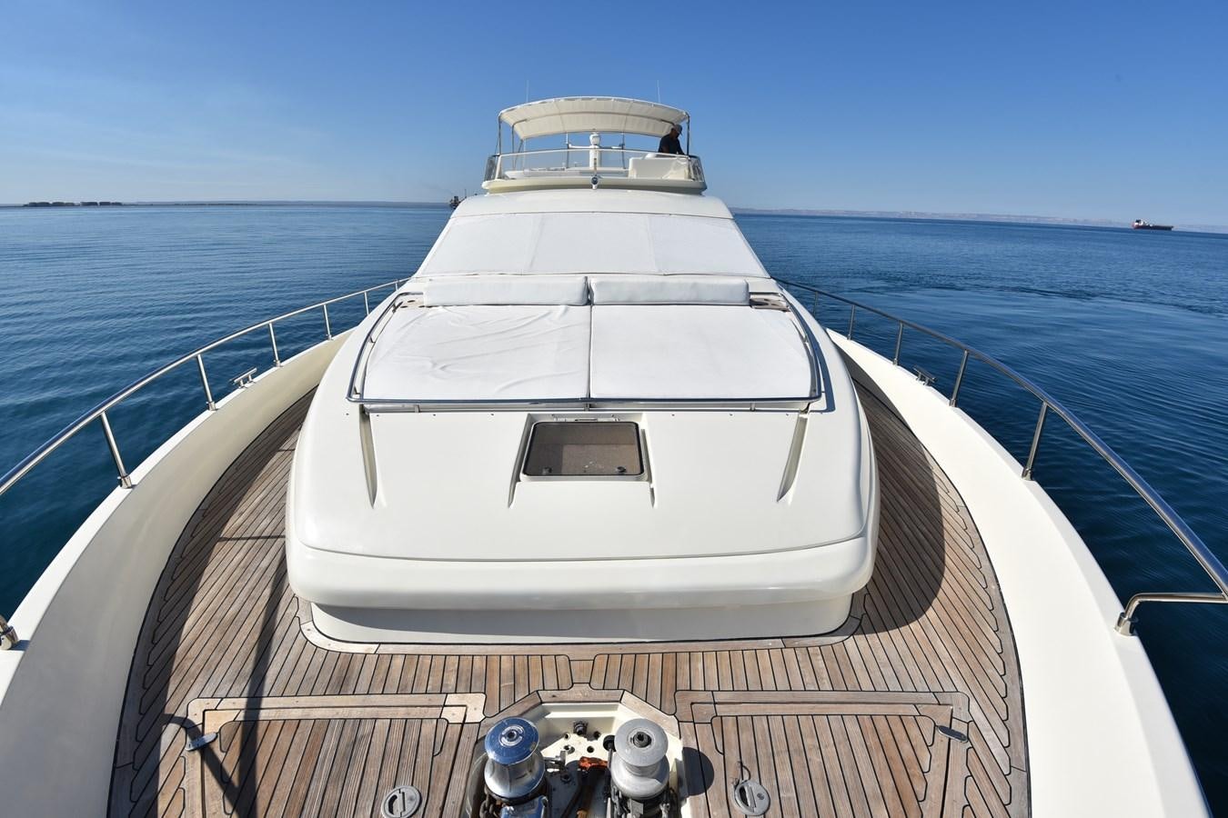 a boat on a deck aboard SANTA MARIA III Yacht for Sale