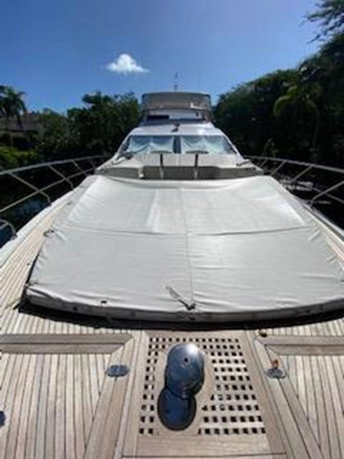 a round metal dome on a wooden deck aboard FORTUNA Yacht for Sale