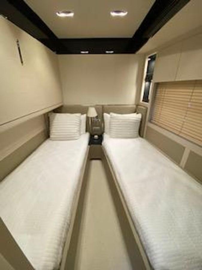 a bathroom with a tub and a sink aboard FORTUNA Yacht for Sale