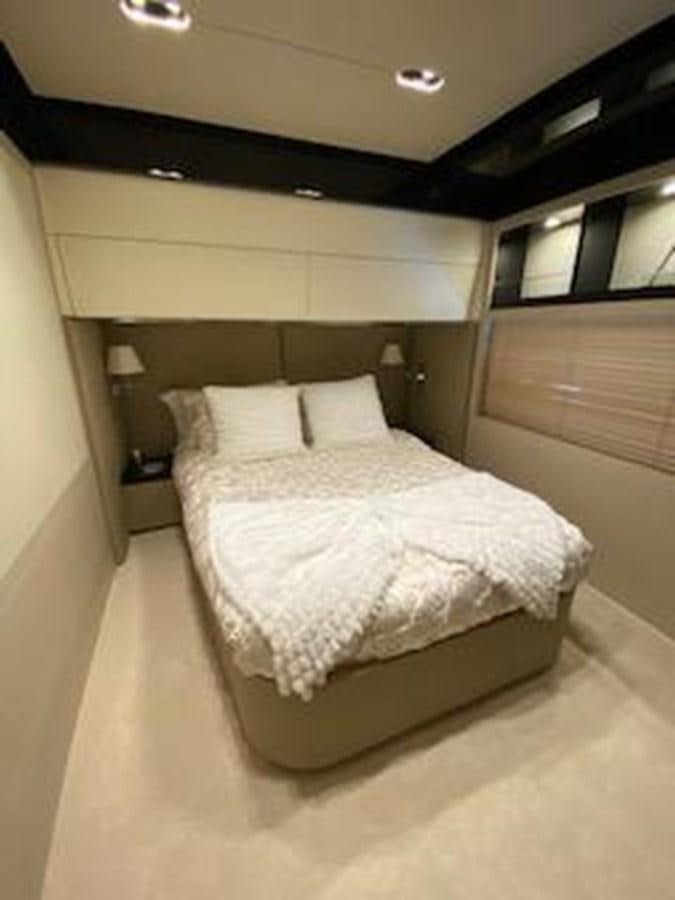 a bed in a room aboard FORTUNA Yacht for Sale