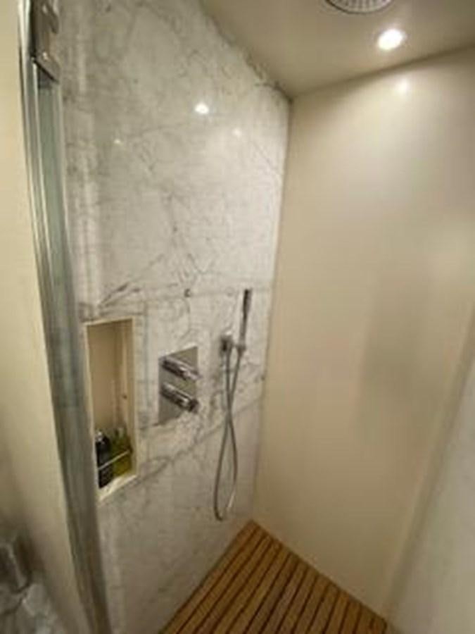 a bathroom with a shower aboard FORTUNA Yacht for Sale