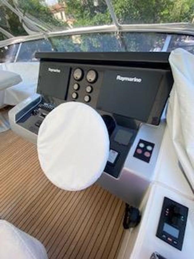 a close-up of a car stereo aboard FORTUNA Yacht for Sale