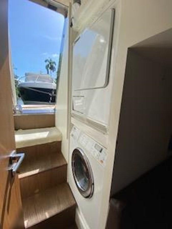 a white door with a window aboard FORTUNA Yacht for Sale