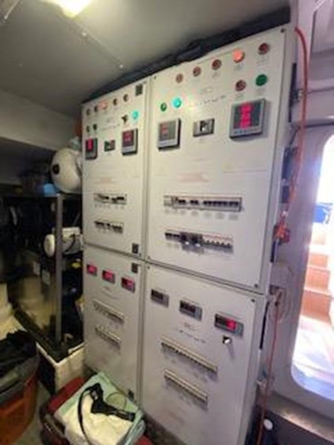 a white machine with buttons aboard FORTUNA Yacht for Sale