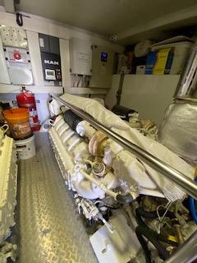 a room with a lot of clutter aboard FORTUNA Yacht for Sale