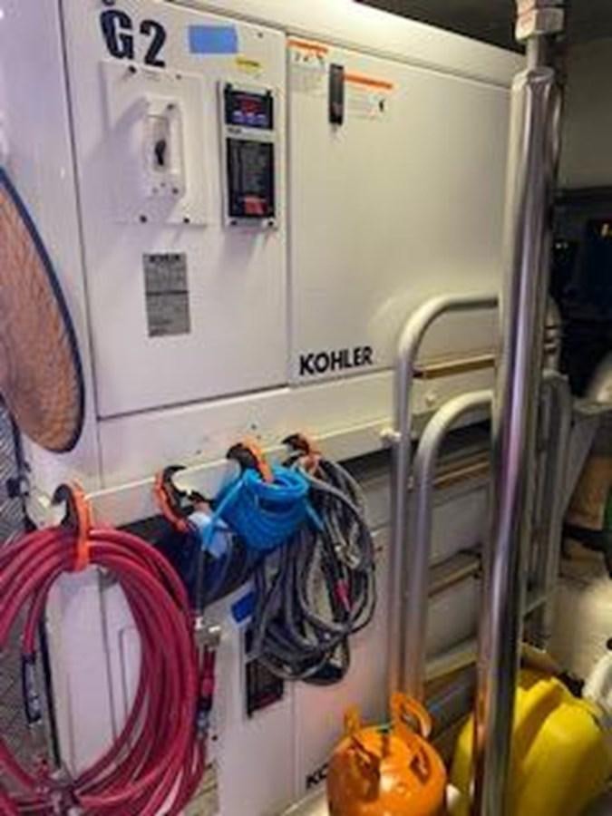 a white machine with wires aboard FORTUNA Yacht for Sale
