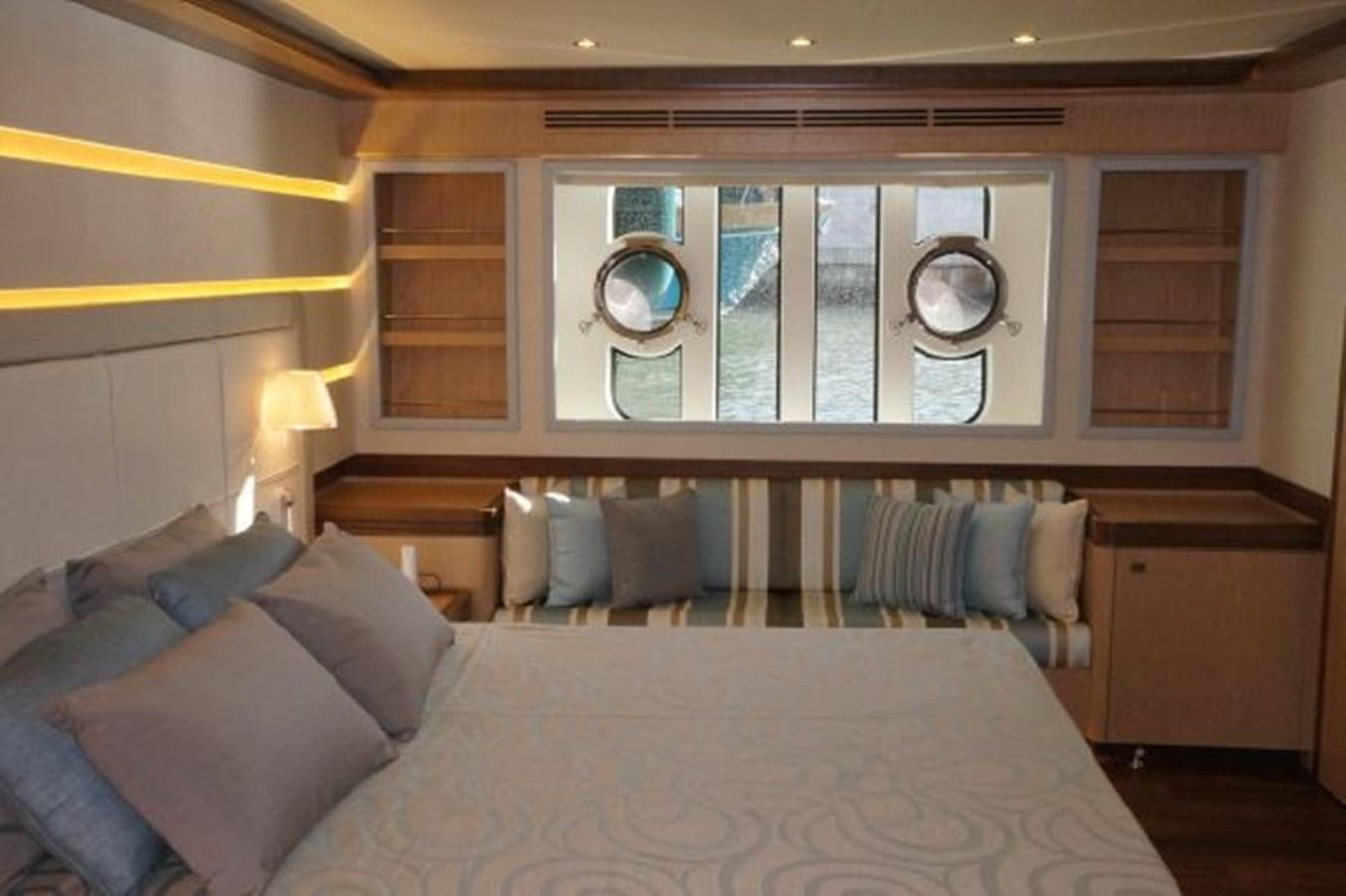 a large bed in a room aboard SANGRIA Yacht for Sale
