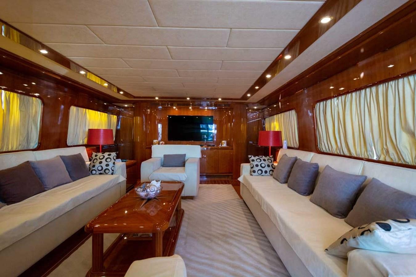 a room with a couch and a table aboard ARISTON FIVE Yacht for Sale