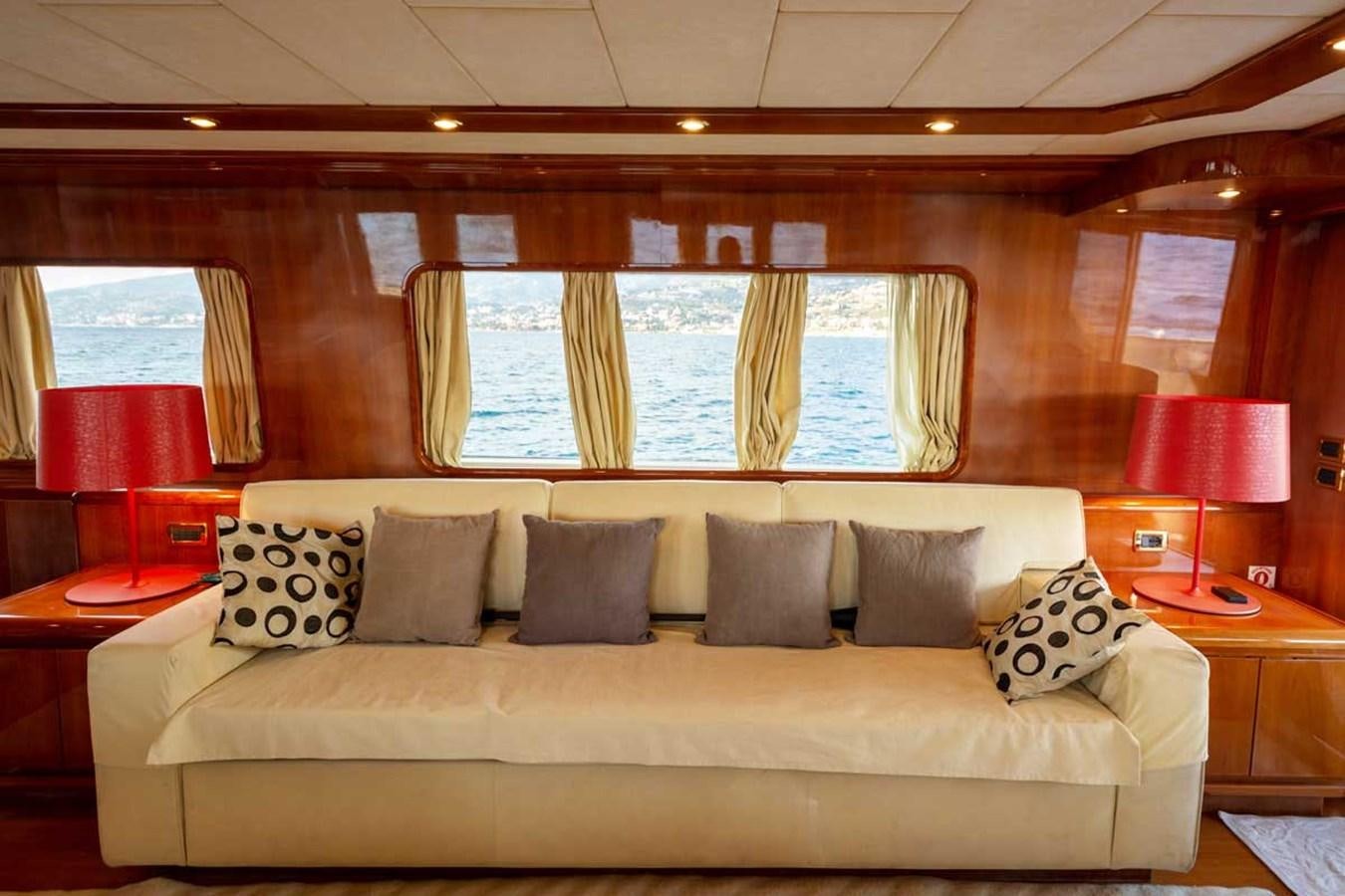 a couch in a room aboard ARISTON FIVE Yacht for Sale