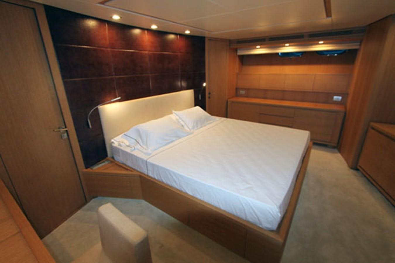 a bed in a room aboard JAD Yacht for Sale